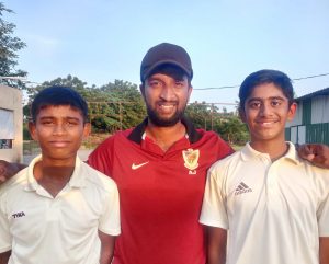 G Prem and Aryan Reddy with Coach Ashwin Vijay